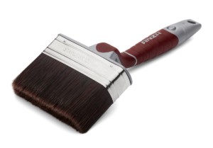 Ergonominen punainen sivellin, joka on sovitettu maalaamiseen mutamaalilla.